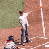 a baseball player with the number 27 on the back of his shirt