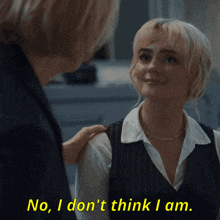 a woman talking to another woman with the words no i don 't think i am