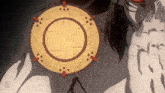 a close up of a person holding a circular object in their hands .