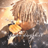 a picture of a person with dreadlocks and the words " your dogshit "