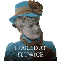 a woman wearing a blue hat and a scarf says i failed at it twice