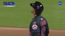 a baseball player wearing a helmet and a jersey that says phillips on it