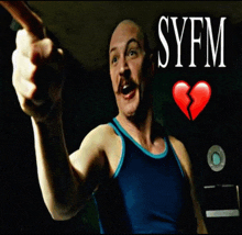 a man in a blue tank top is pointing with syfm written on the bottom