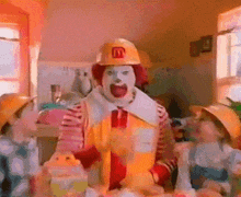 mcdonald 's clown wearing a hard hat with a mcdonald 's logo on it