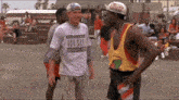 a man wearing a parental advisory explicit lyric shirt