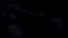 a cartoon drawing of a person sitting on a ledge next to a large letter e