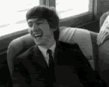 George Harrison The Beatles GIF - George Harrison The Beatles Laughing GIFs