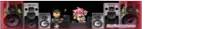 a blurry image of a group of people standing in front of speakers