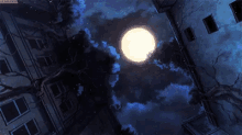 a full moon shines brightly in a dark night sky