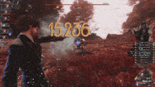 a man in a suit is standing in a field with the number 15236 displayed on the screen