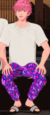 a man with pink hair is wearing a white shirt and pink pants