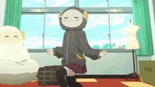 a girl wearing a sheep hoodie is dancing in a room