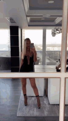 Blonde Selfie GIF - Blonde Selfie Black Dress GIFs