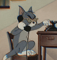 a cartoon of tom talking on a phone
