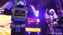 a gif from gifrun.com shows a robot performing