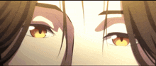 a close up of a person 's eyes with a yellow iris