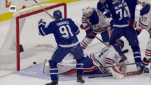 a hockey player with the number 91 on their jersey
