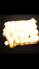 a glowing sign that says new york on a black background