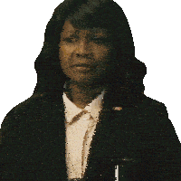 a woman in a suit has a badge on her jacket that says presidential
