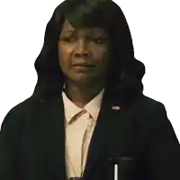 a woman in a suit has a badge on her jacket that says presidential