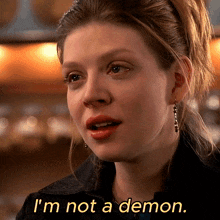 a woman says i 'm not a demon while looking at the camera