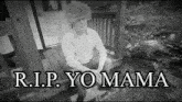 a black and white photo of a man sitting on a porch with the words " rip yomama " written below him