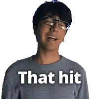 a man with glasses and a shirt that says that hit on it