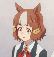 a close up of a girl with ears and a red bow tie