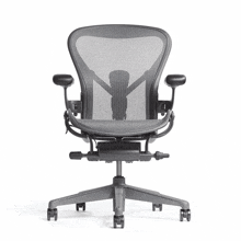 a black office chair with a mesh back and arm rests on a white background