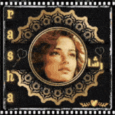 a picture of a woman in a gold frame with the letters r a s h a