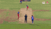 a blurry picture of a cricket game with ipl written on the bottom right