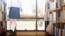 a girl in a school uniform walks through a library filled with books