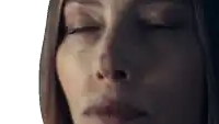 a close up of a woman 's face with eyes closed