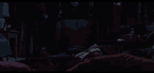 a blurry picture of a dark room with candles on the couch