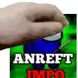 a hand is holding a blue cup with a knife in it .