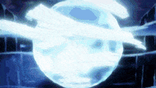 a blue light is coming out of a sphere in the middle of a dark room .