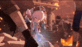 a pink haired anime girl is standing in front of a fire in a building .
