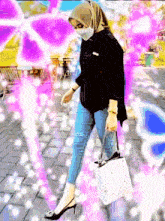 a woman wearing a hijab and a mask is walking down the street