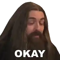a man with long hair and a beard has okay written on his face