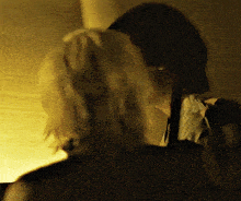 a close up of a person 's back with a blurred background
