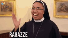 a nun with the word ragazze written on the bottom