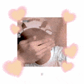 a person covering their face with a hat that says 9 pm on it