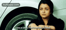 a woman is sitting in front of a car with the words i was so alone i had loved him you know