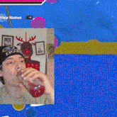 a man drinking from a glass with a reindeer in the background and a view names button