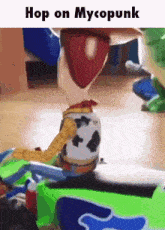 a toy story character with the words hop on mycopunk written on the bottom