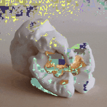 a pixelated image of a piece of popcorn with a few spots of gold