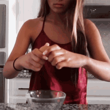 Cracking An Egg Caroline Manning GIF - Cracking An Egg Caroline Manning Making A Meal GIFs