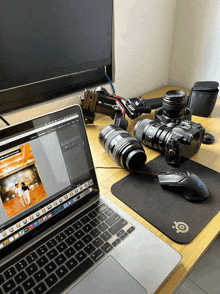 a laptop is open to a screen that says ' adobe photoshop ' on it
