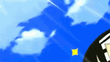 a blue sky with a yellow square in the foreground