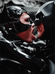 Cat Woman Lick GIF - Cat Woman Lick Batman GIFs